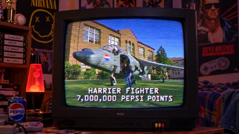 A 1990s television showing the Pepsi advert with a Harrier jet and the caption Harrier Fighter 7,000,000 Pepsi Points