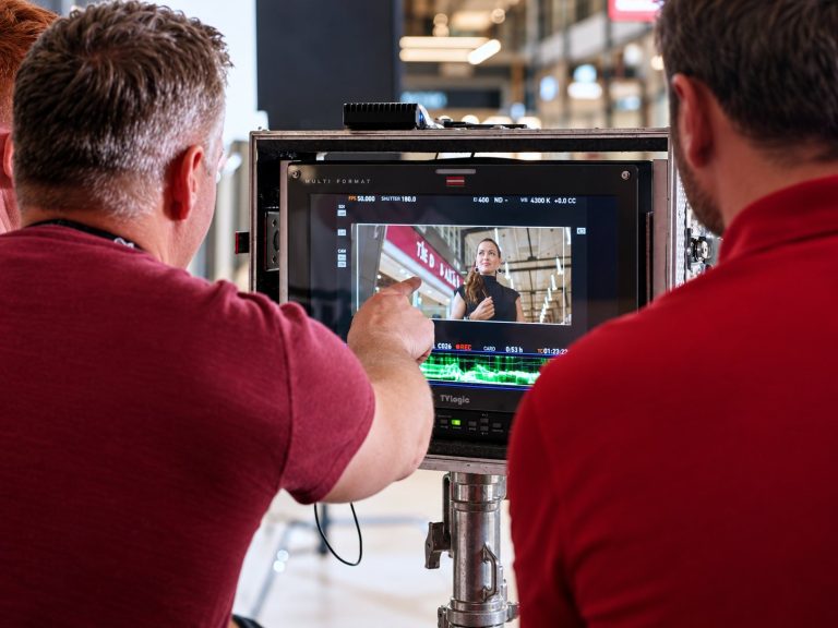 Two crew members reviewing a shot on a monitor