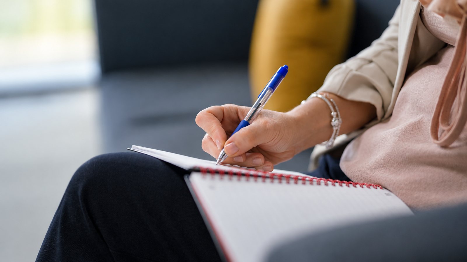Notes being written in a notebook while a shoot is planned